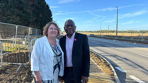 Councillor Jane Carr and Councillor Tony Oyakhire by the newly opened A509