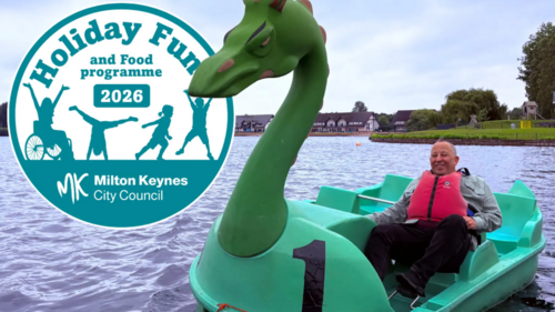 Councillor Peter Cannon takes to the water on Willen Lake – pedalos are one of many activities available to local children this summer