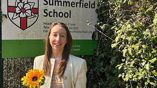 Cllr Clare Tevlin outside Summerfield School