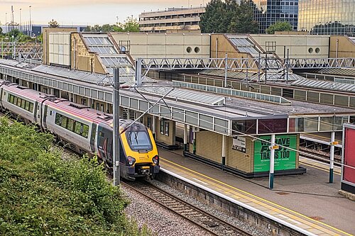 CMK railway station showing an arriving train