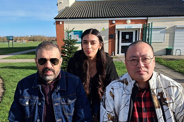 A group photo. Left to right, Asad Raja, Humna Raja and Justin Ko